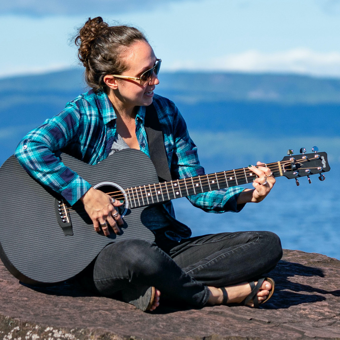 Court playing the guitar